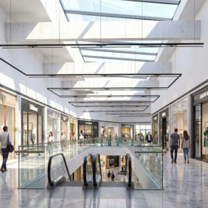Apl-Pendelleuchten in modernem Einkaufszentrum mit großer Glasdecke.