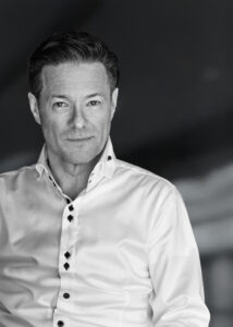 Schwarzweiß-Porträt von Dr. Axel Zein, CEO der WSCAD GmbH.